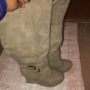 Knee high wide calve boot.